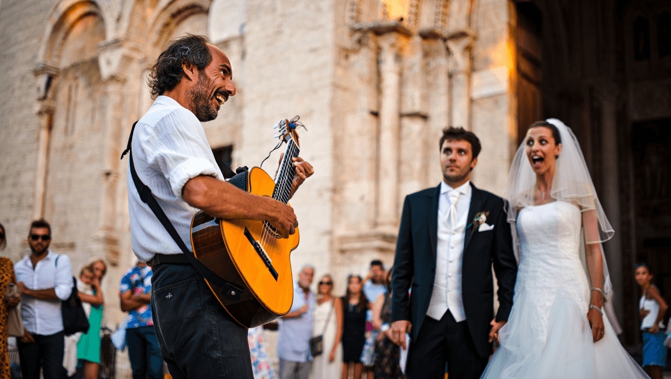 «Posso suonare per gli sposi?», spunta Alfa a un matrimonio a Bari vecchia. La sposa non ci crede, parte il karaoke – Il video